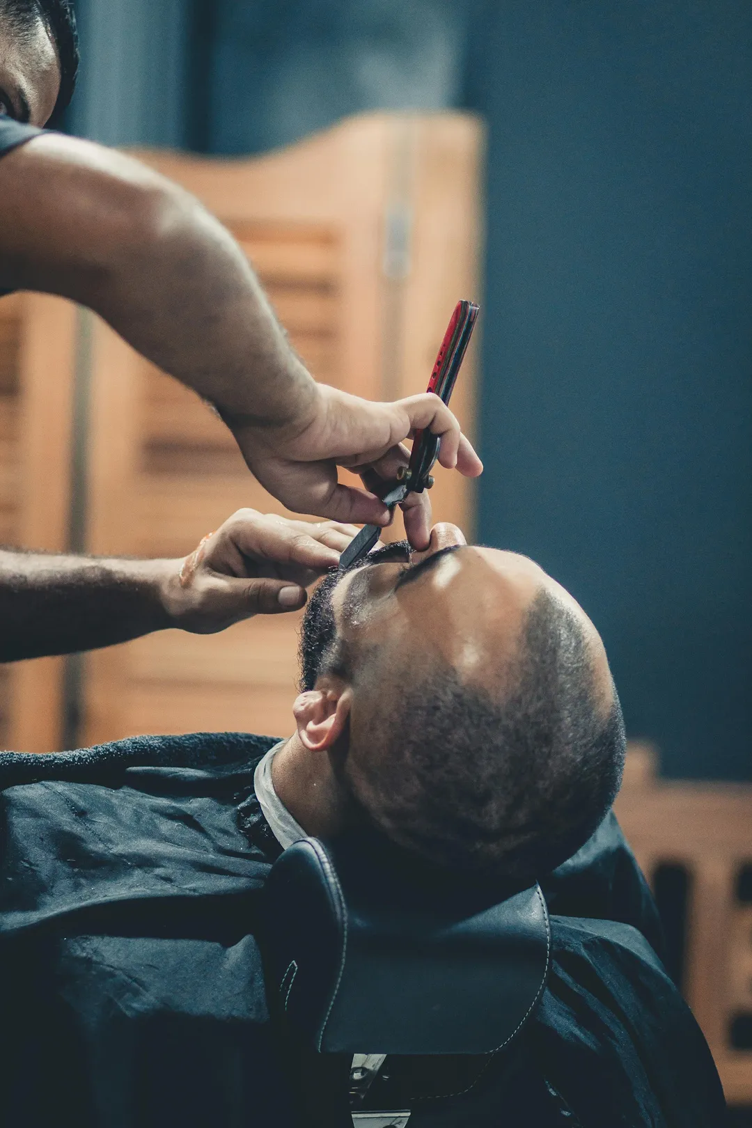 Barber cutting hair
